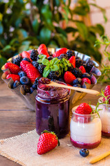 homemade blueberry jam with yogurt with mix of berry