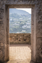 Ischia Island Italy, Castle Aragonese doorway looking onto the island.  Room with a View, no people.