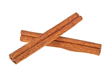 Two cinnamon sticks isolated on white background