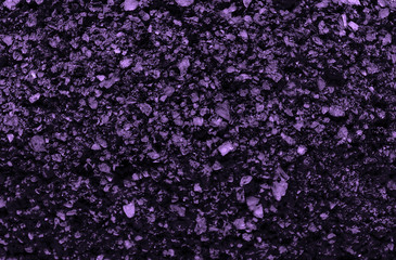 Obraz na płótnie Canvas Sea salt background or texture in violet color. Little minerals