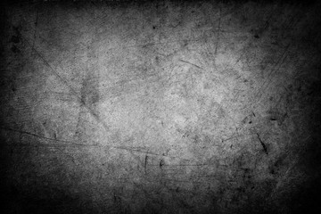 Grunge black concrete texture wall background. Dark edges