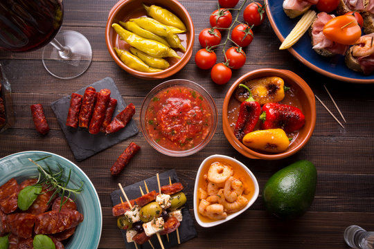 Spanish tapas starters on wooden table