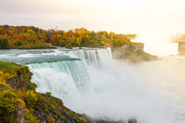 American side of Niagara Falls during sunrise .