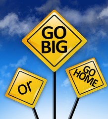 Go big or go home, motivational quote on yellow road sign