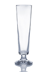 Empty transparent sling glass with reflection isolated on white.