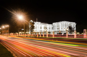 Government building in Skopje, Macedonia with light trails from night trafic