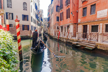 Fototapeta na wymiar Gondola in the canals of venice