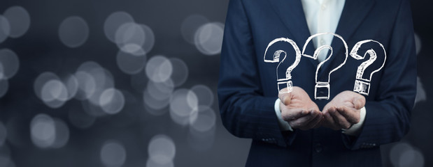 businessman hand  question mark