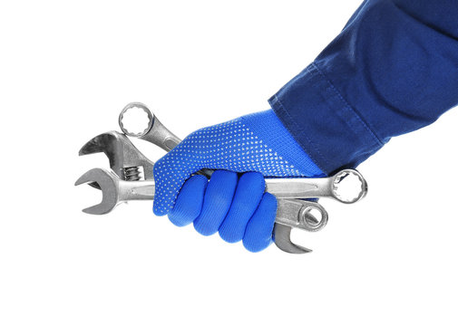 Hand Of Auto Mechanic With Tools On White Background