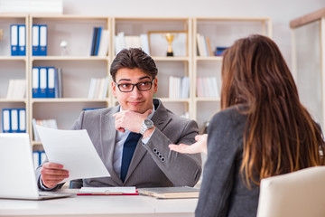 Business meeting between businessman and businesswoman