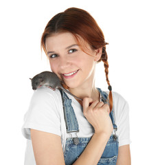 Teenager girl with funny rat on white background