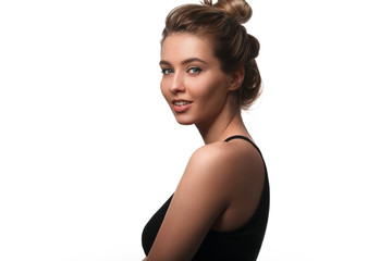 Obraz premium Beautiful smiling woman with clean skin, natural make-up, and white teeth on white