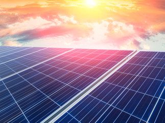 Solar energy panels scene at sunset