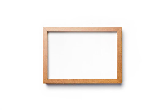 A oak wood photo(picture) frame) isolated white.