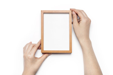 woman hand hold a photo frame isolated white.