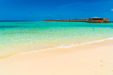 Beautiful water villas in tropical Maldives island  .