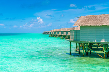 Beautiful water villas in tropical Maldives island  .