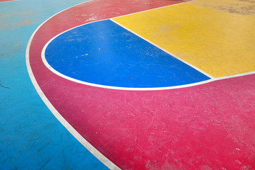 colorful outdoor concrete basketball court.