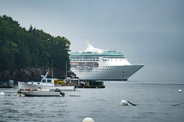 Large Cruise Ship Passing by Small Island