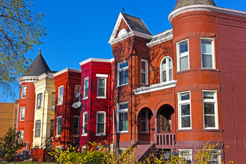 Residential townhouses of suburban Washington DC in spring. Colorful urban architecture of Shaw neighborhood in US capital.