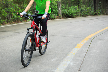 Fototapeta na wymiar cyclist cycling mountain bike on forest trail