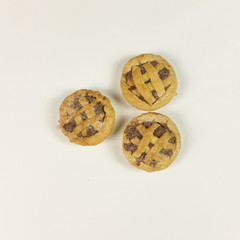 Tart with chocolate cream on white background - top view