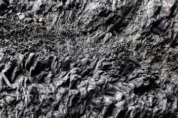 Rock formations on the Reynisfjall mountain, located on the Reynisfjoru beach, near the village of Vik in southern Iceland.