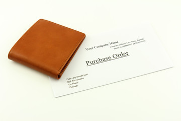 Brown wallet with purchase order on a white background