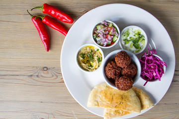 Falafel in Ramiken with Pita and Sides