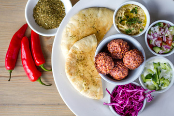 Falafel in Ramiken with Pita and Sides