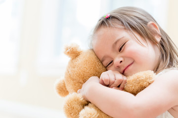 Little girl with teddy bear