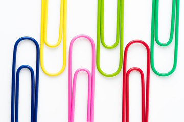 colorful paperclips isolated on white background
