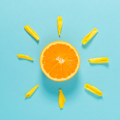 Orange slice as the sun concept