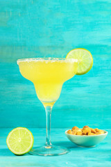 Margarita cocktail photo on vibrant background with copyspace