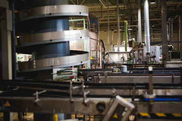 Beer production line. Equipment for the staged production and bottling of the finished product. Special industrial technological device at the factory