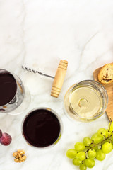 Glasses of red and white wine at tasting