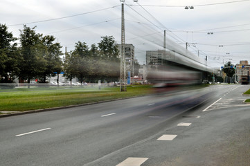 Fototapeta na wymiar Abstract urban landscape. Transport dynamics in the streets.