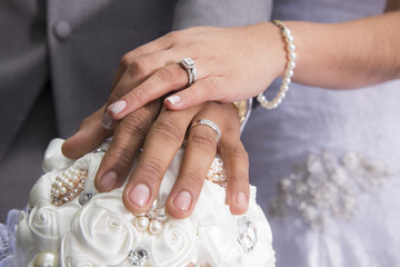 Couple showing wedding rings