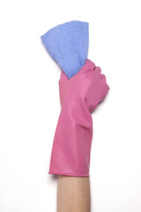 woman hand wearing a pink rubber glove with rag(mop) isolated white.