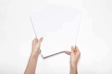 woman hand hold a letter paper isolated white.
