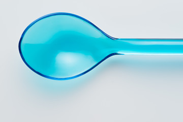 Color plastic swizzle sticks on white background