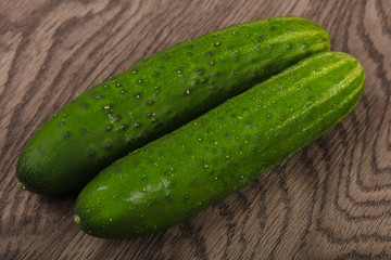 Two green cucumbers