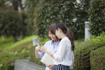 Fototapeta premium The two business women are meeting outside the office