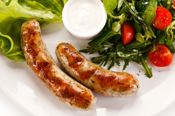 Breakfast - fried white sausages and vegetables