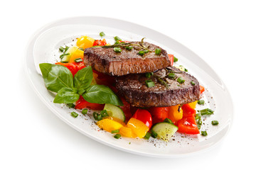 Grilled steaks with vegetables