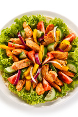 Grilled chicken strips with vegetable salad