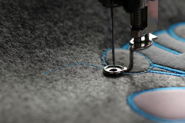 embroidery and application with embroidery machine - foundation for satin stitch- background and foreground blanked out blurry