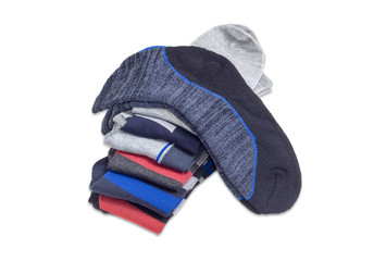 Pair of men's sock on the stack of other socks