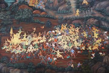 Fototapeta premium Traditional Thai painting art about Ramayana story on display at the temple wall Wat Prakaew in Bangkok, Thailand.