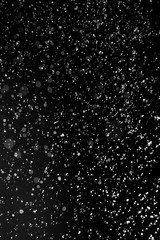 spray water on a black background